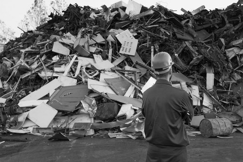 Workers managing construction debris