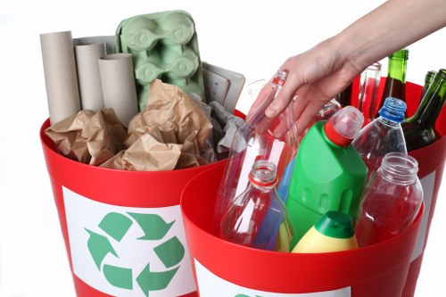 Workers sorting recyclables in a sustainable rubbish area